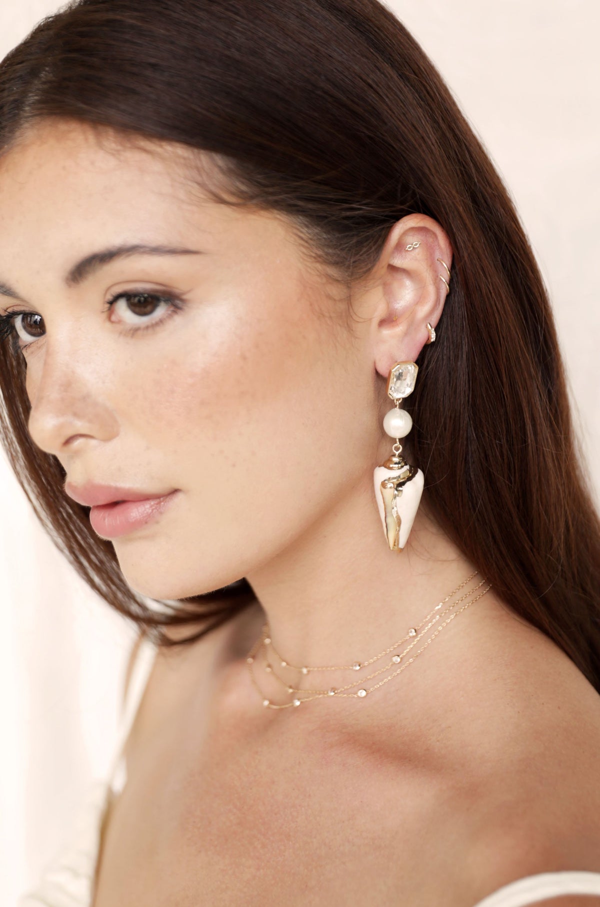 Golden Rimmed Shell Dangle Earrings - Shell with 18k Gold Plating | Ettika