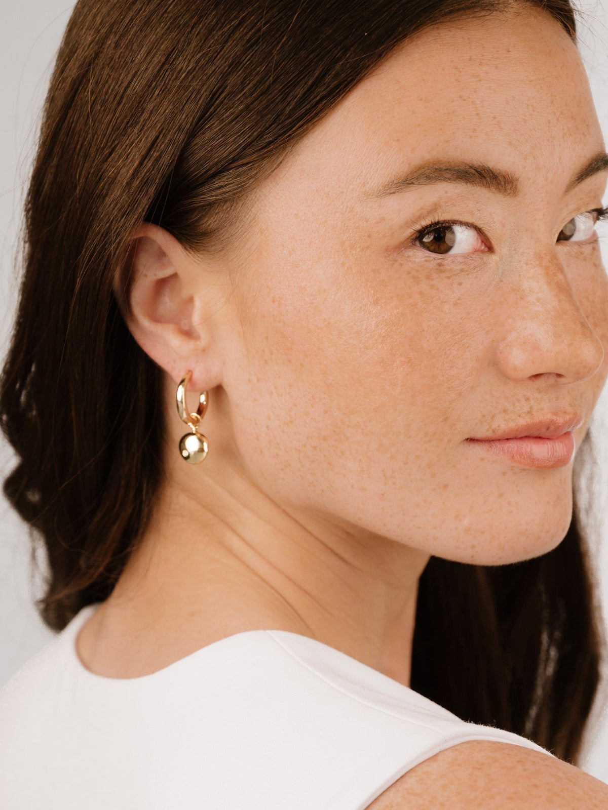 Polished Pebble Huggie Hoop Earrings - 18k Gold Plated | Ettika