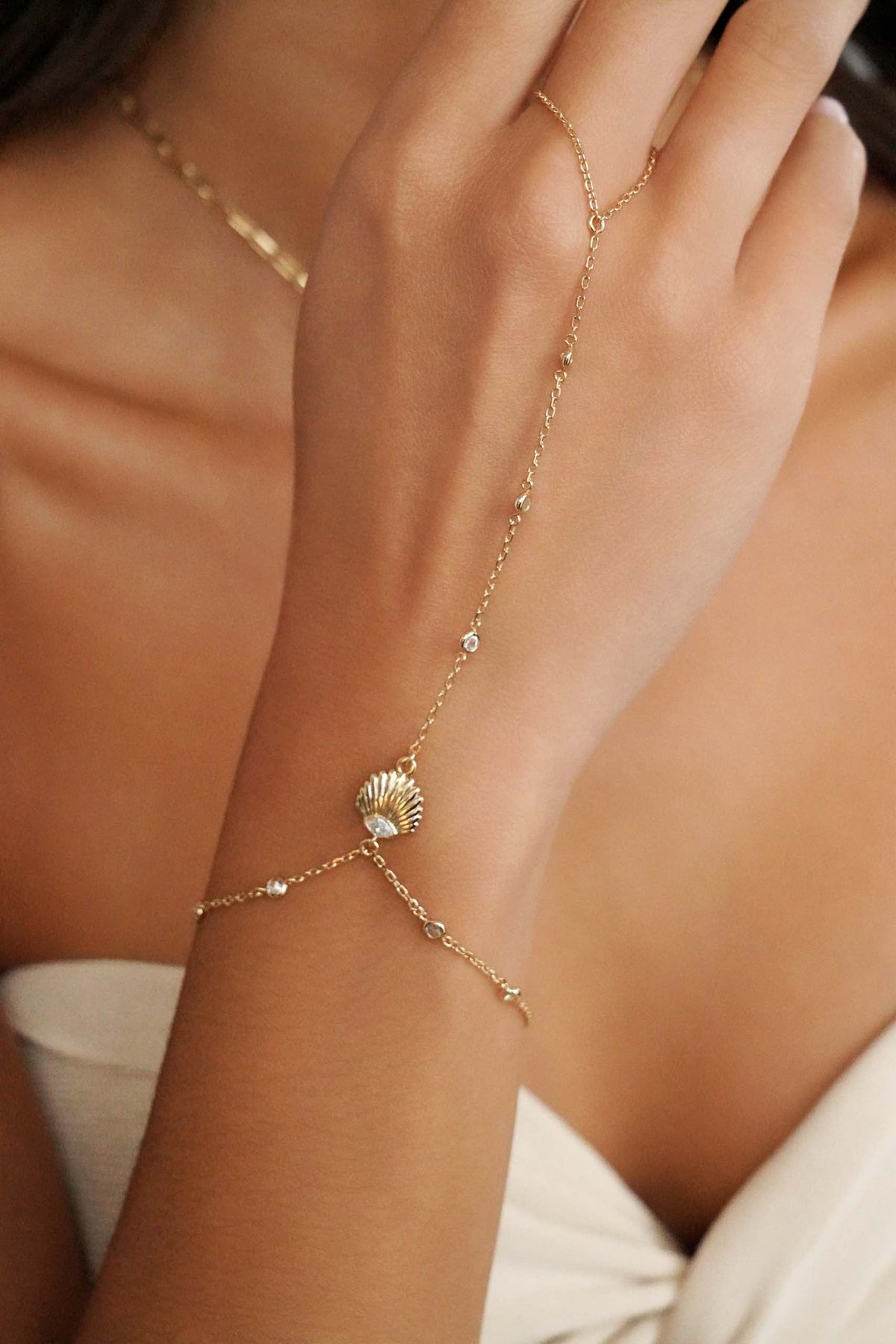 Santorini Shell Hand Chain - Clear Crystal with 18k Gold Plating | Ettika